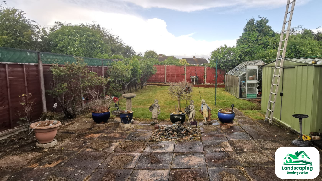 After: Basingstoke garden fitted with a new paved patio and freshly laid turf lawn