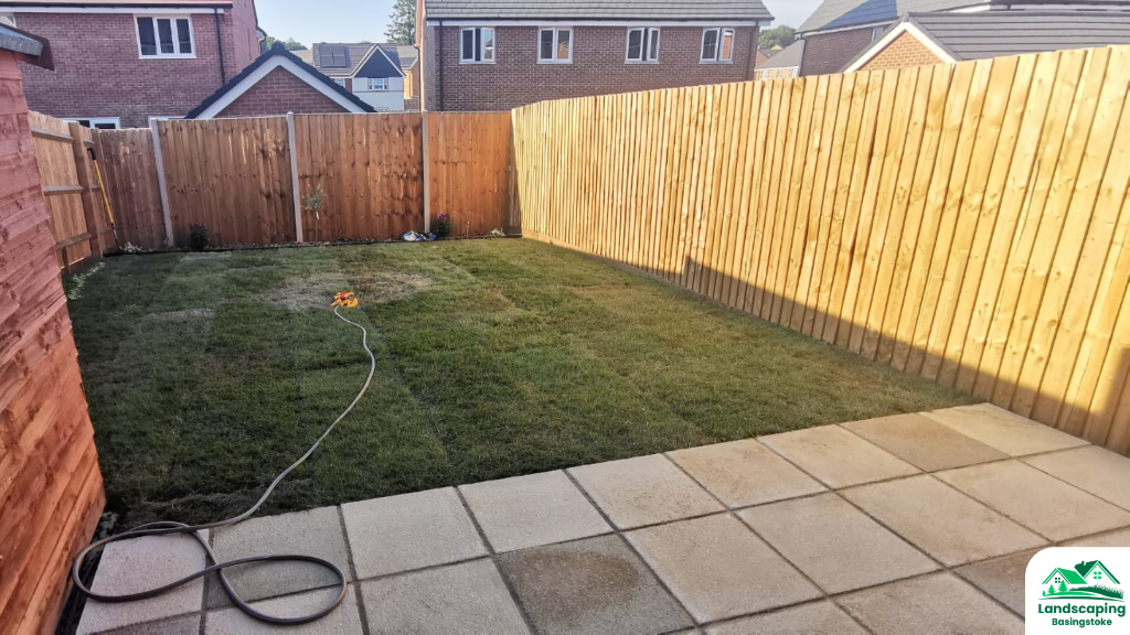 After: Overgrown Basingstoke back garden cleared and finished with freshly laid turf and clean lawn edges