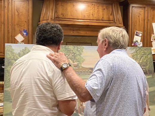 Jack and Barbara Nicklaus seeing the completed family portrait for the first time