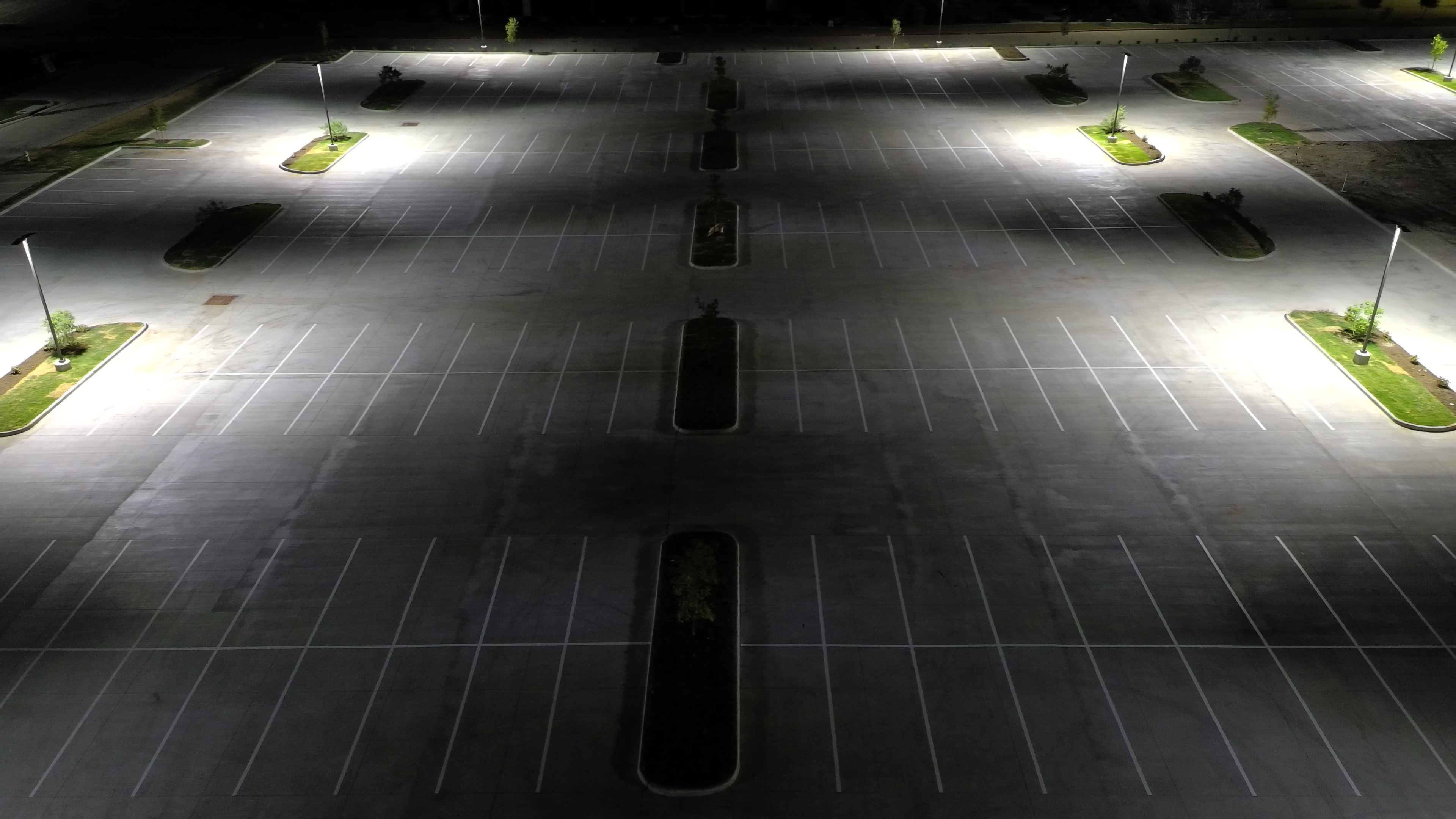 Aerial night parking lot striping