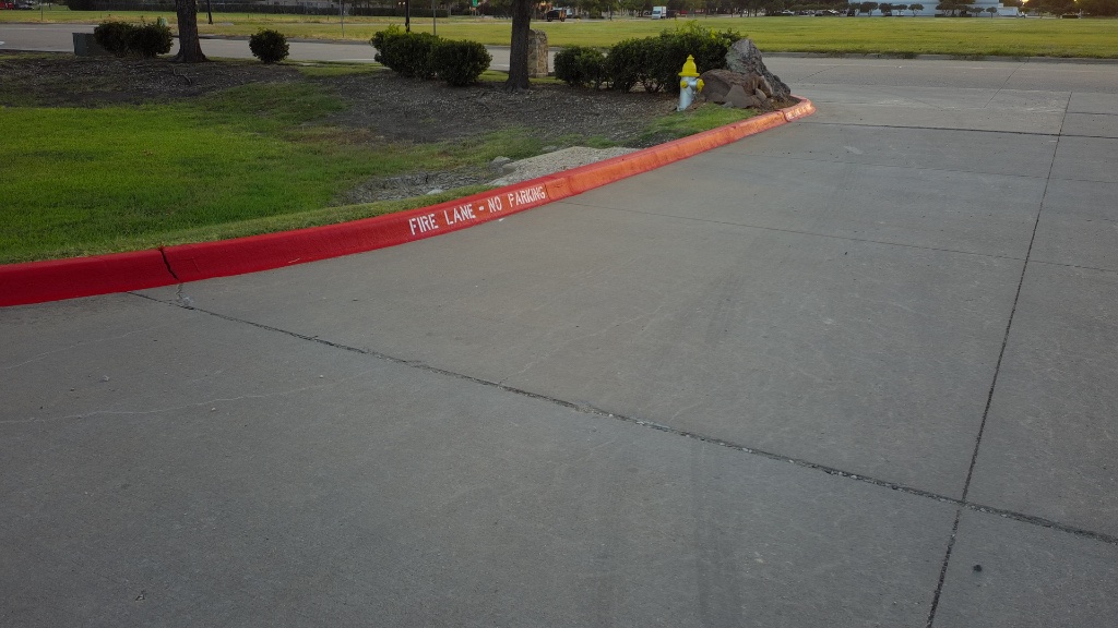 Fire lane curb painting