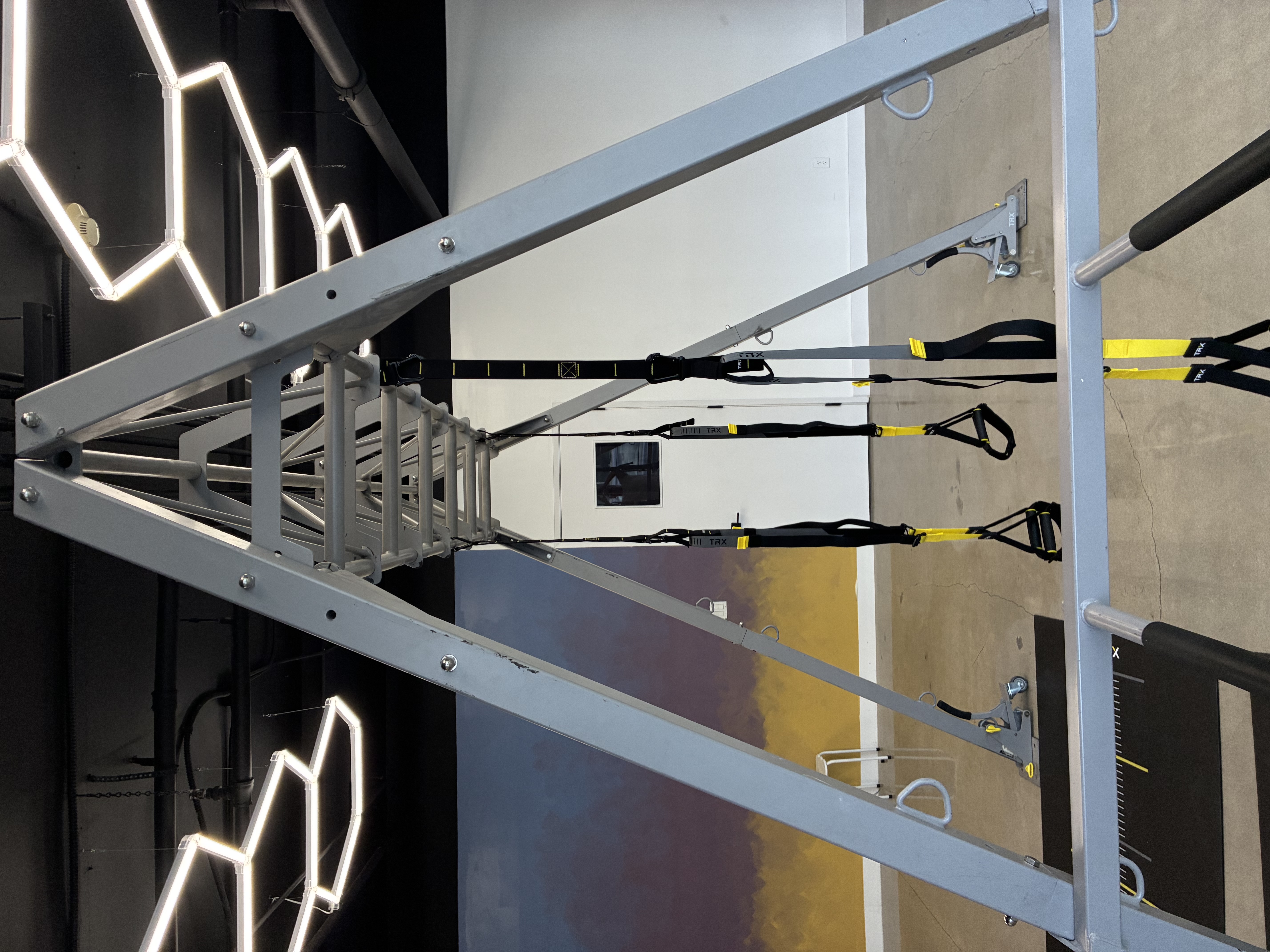TRX A-frame suspension rig in the Illuminate Studios training bay