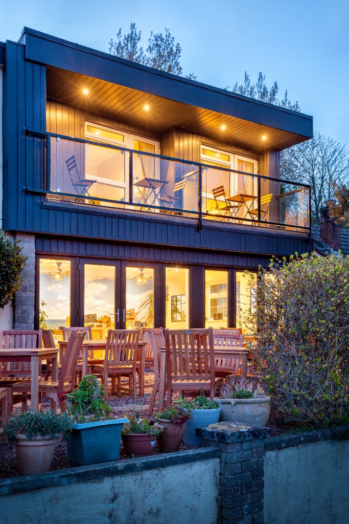 Avoncourt Lodge garden and terrace at dusk