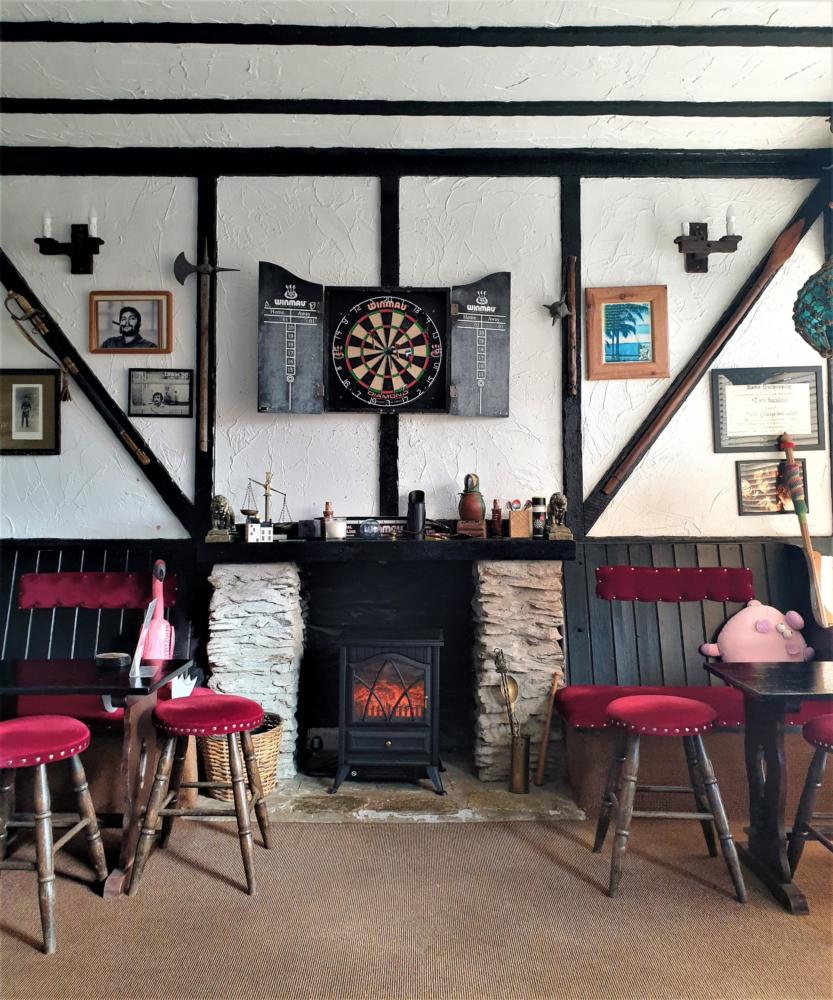 Guest lounge and honesty bar at Avoncourt Lodge guest house, Ilfracombe