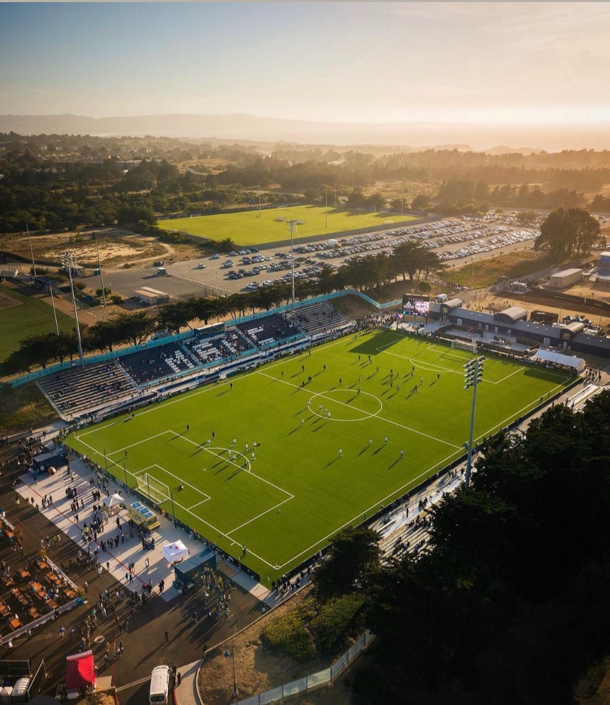 Soccer stadium aerial view at sunset