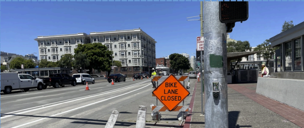 Bike lane closed sign near the Webster Tube construction zone