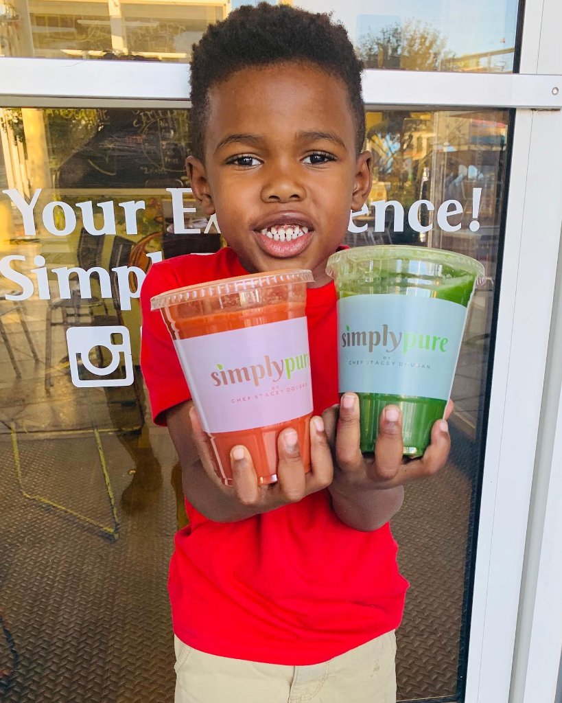 Young boy with fresh juices