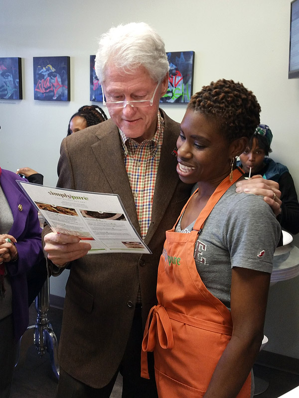 President Bill Clinton reviewing the menu with Chef Stacey