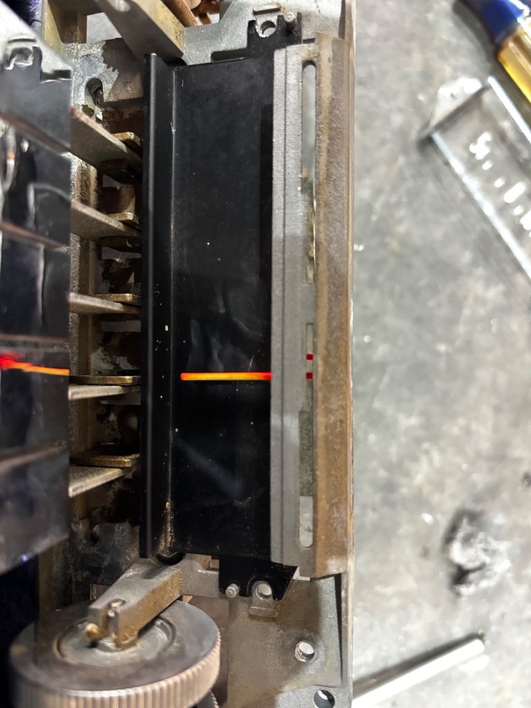 Dial pointer before refinishing and vintage car radio repair