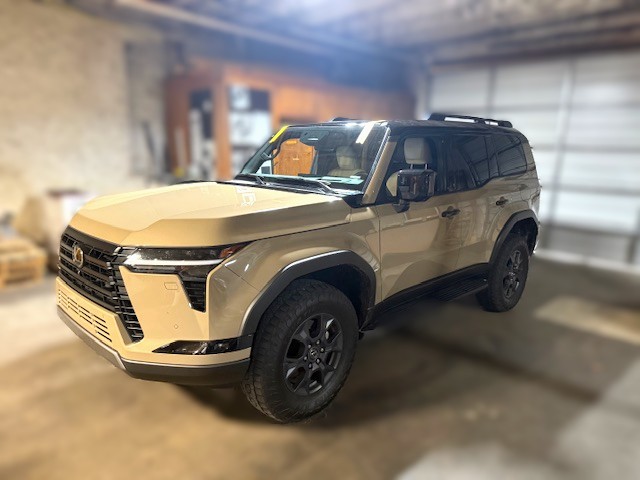 Tan Lexus GX 550 SUV with roof rails at Capitol Glass shop
