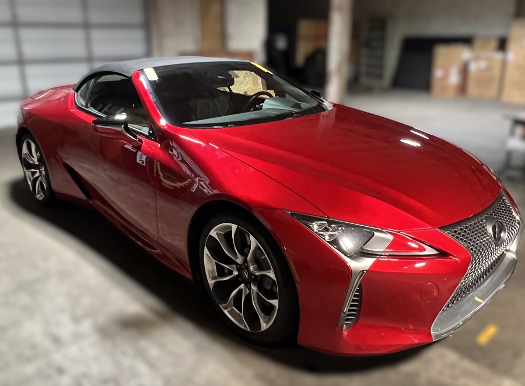Red Lexus LC 500 convertible in Capitol Glass shop
