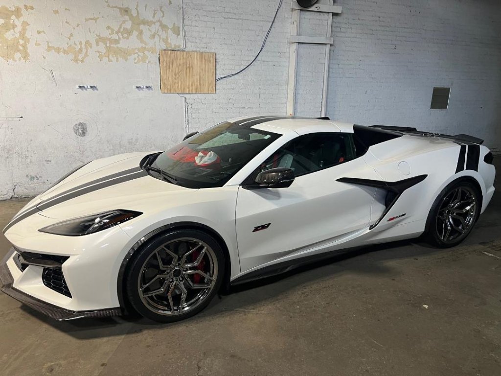 White Chevrolet Corvette Z06 with carbon fiber accents at Capitol Glass