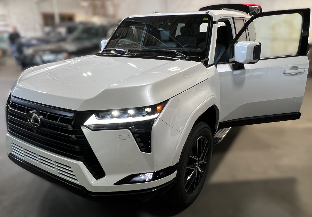 White Lexus GX SUV with door open at Capitol Glass