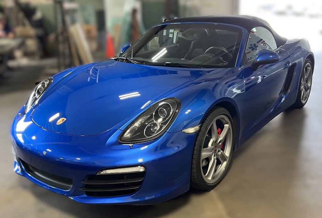 Blue Porsche Boxster at Capitol Glass shop