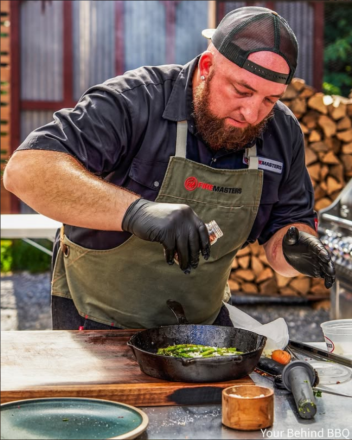 Pitmaster tending the smoker