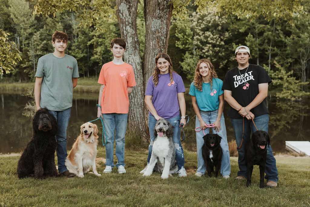 Our Pink Paws family with their dogs