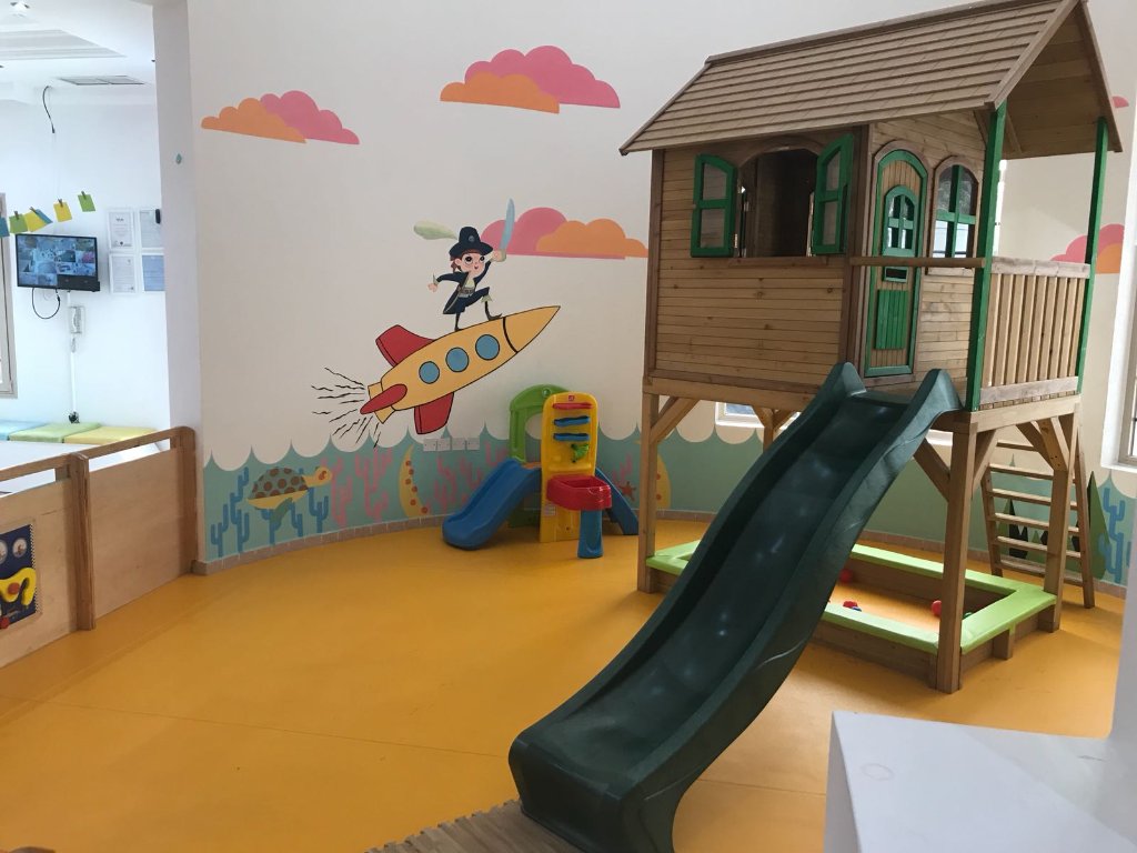 Children learning in a modern preschool classroom