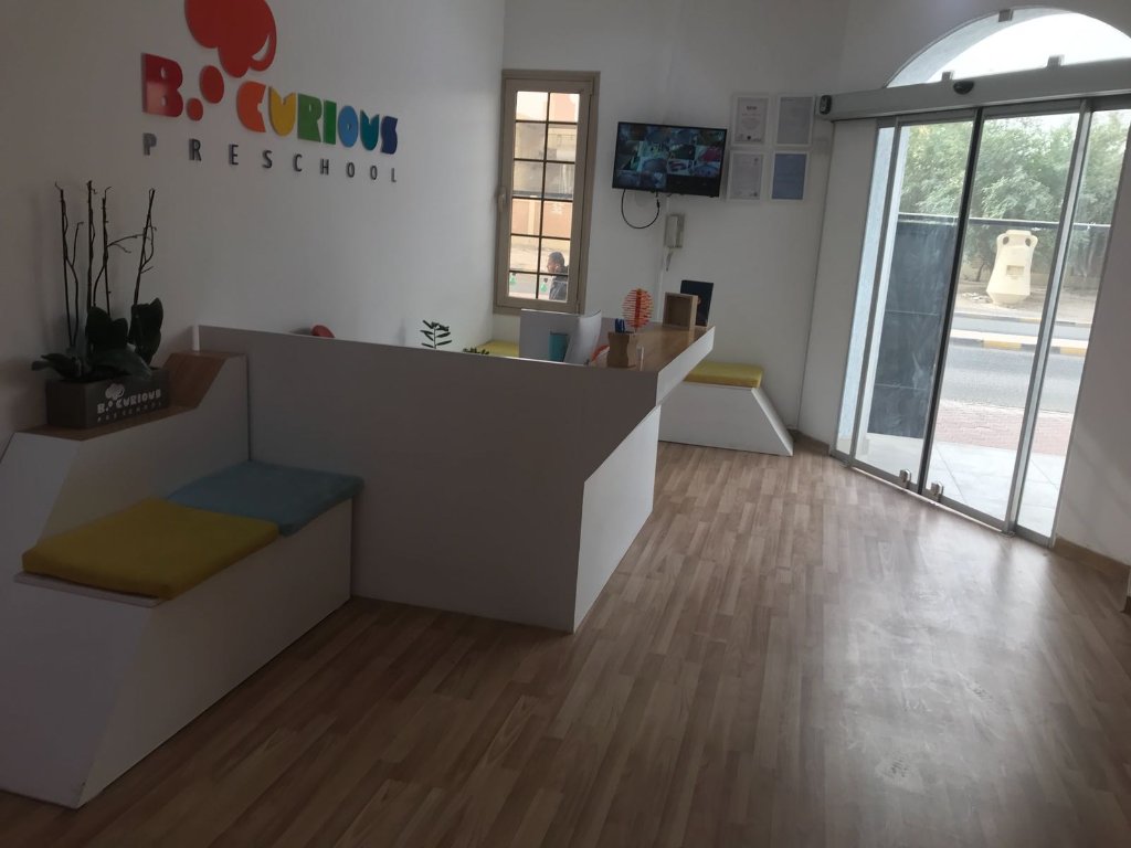 Iglookids preschool reception with colorful B.Curious branding