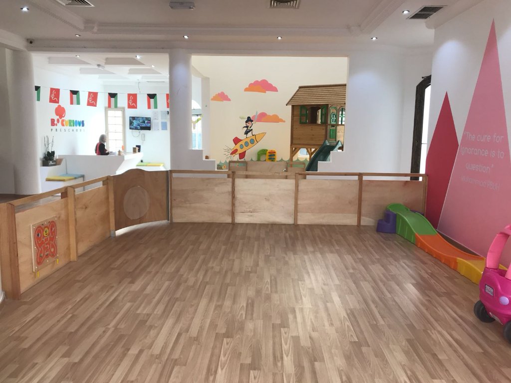 Iglookids open classroom and play hall with wooden furniture