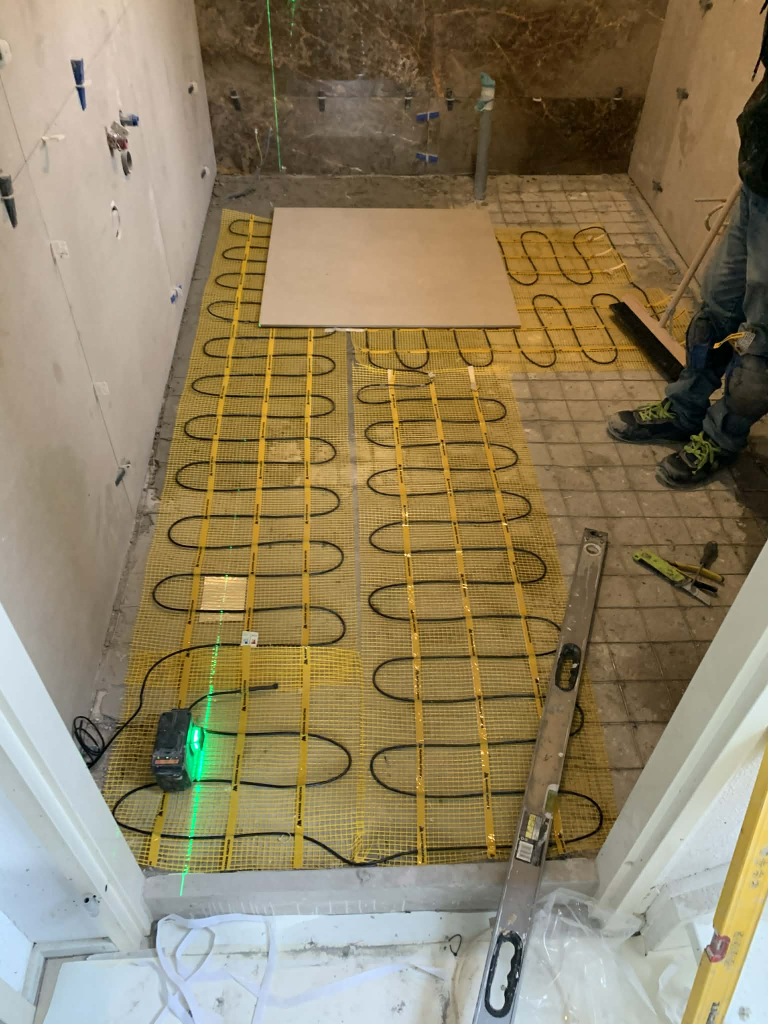 Vloerverwarming installatie badkamer