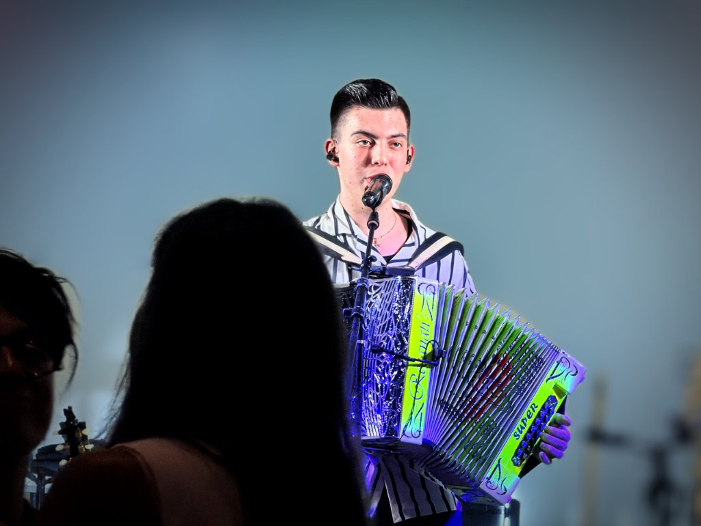 Musician singing on stage at Taste of Portugal 2026