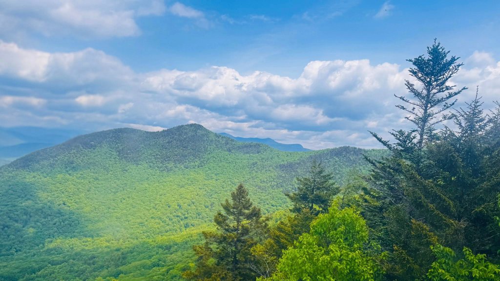 Rolling green mountain range panorama