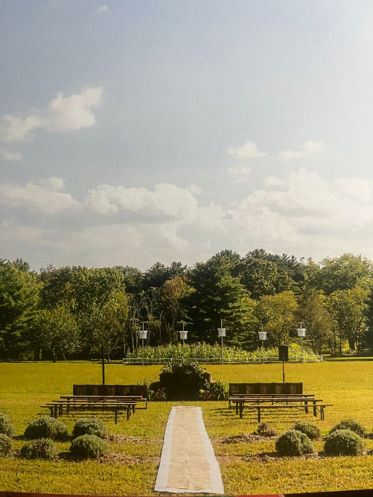 Wedding ceremony setup surrounded by flower fields at Beyer Blossom Estate, NJ