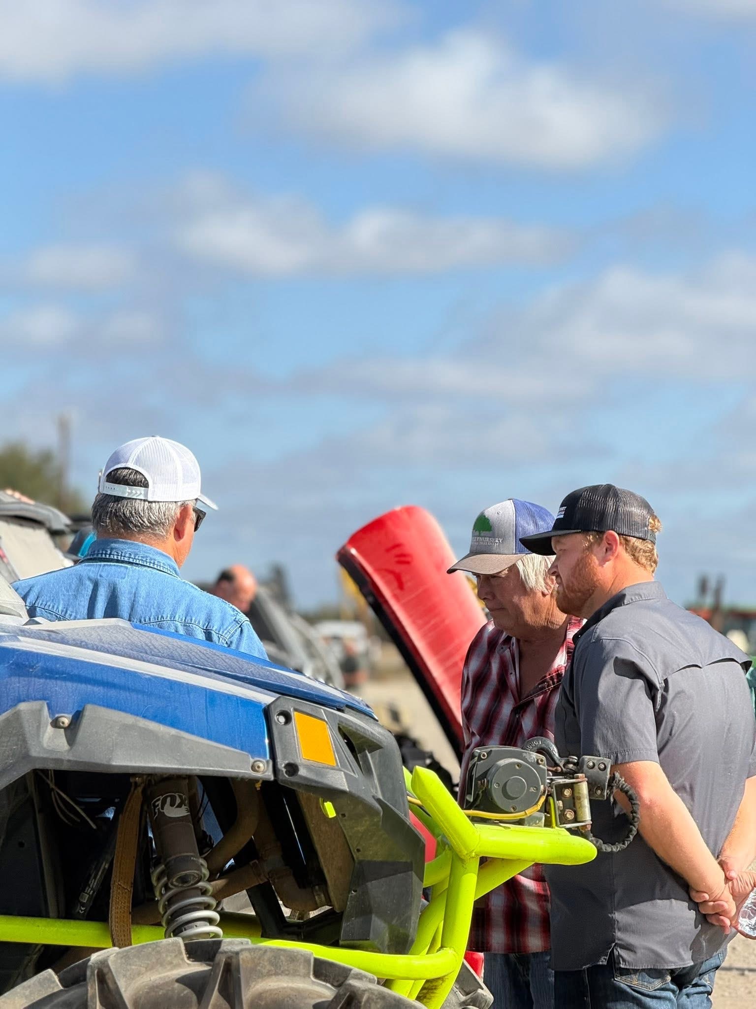Equipment buyers at auction