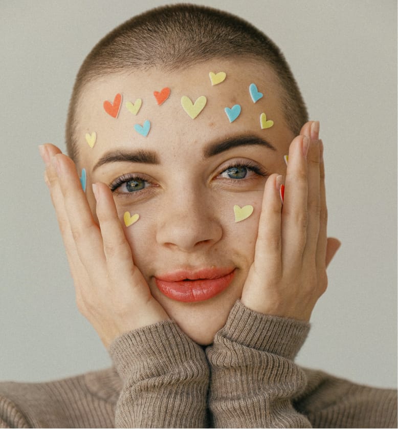 Woman with hearts on her face