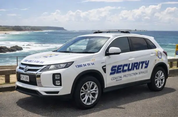 CPS security patrol vehicle at coastal headland — Central Coast
