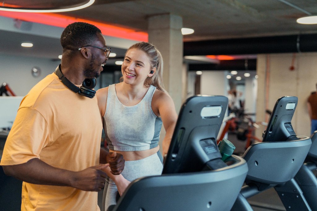 Happy customer on treadmill — Redhawk Handyman Services OKC
