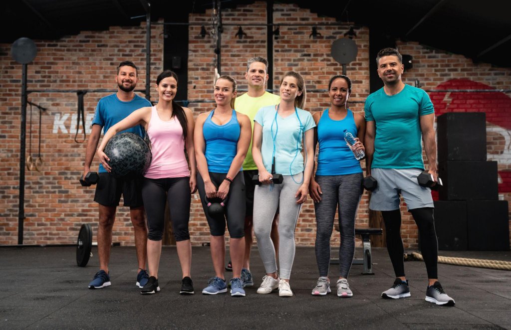 Group of happy fitness customers — Redhawk Handyman Services OKC