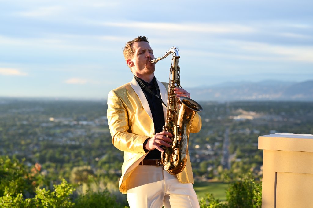 Jeff Carlsen performing saxophone on stage