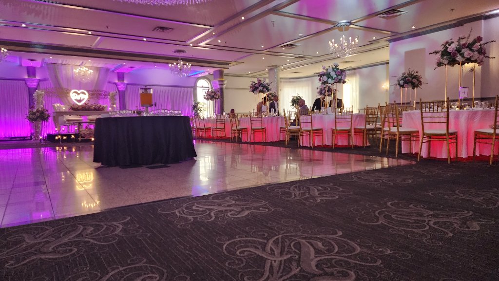 Wedding reception hall with purple lighting