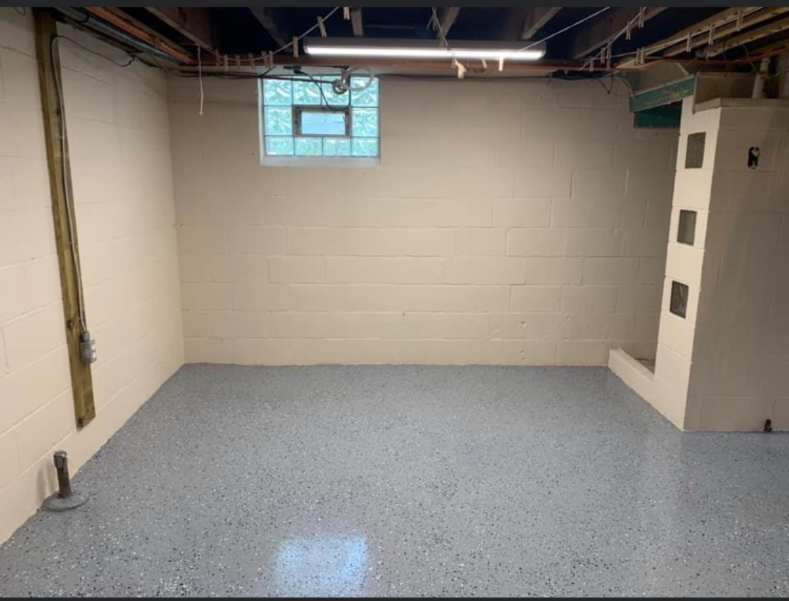 After — Main Room: Fresh Paint Walls & Epoxy Chip Floor — Youngstown, OH