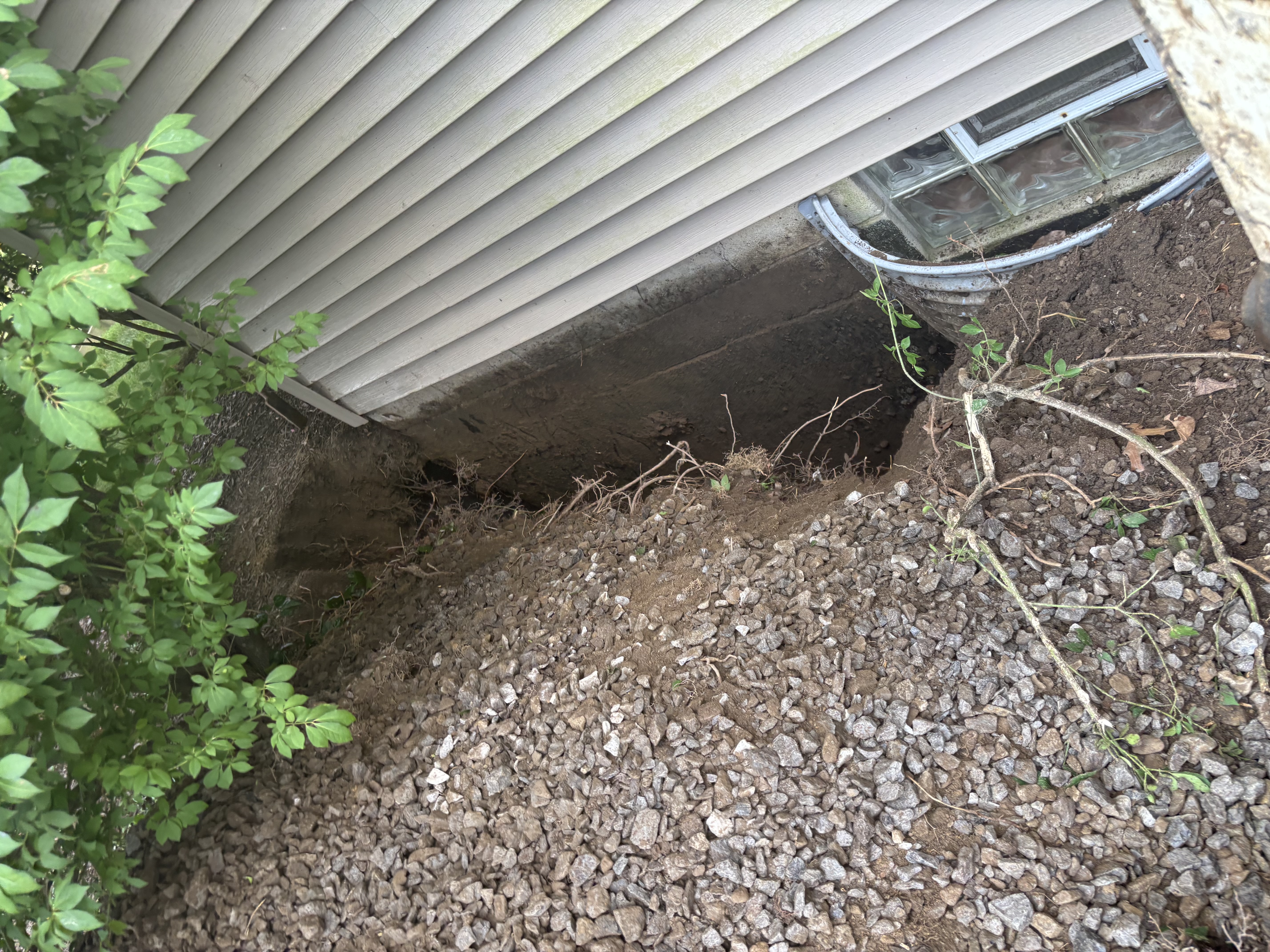 Technician Sealing Foundation Wall — Boardman, OH