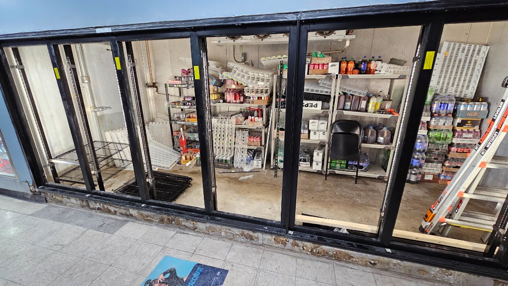 Walk-in cooler interior with reach-through doors