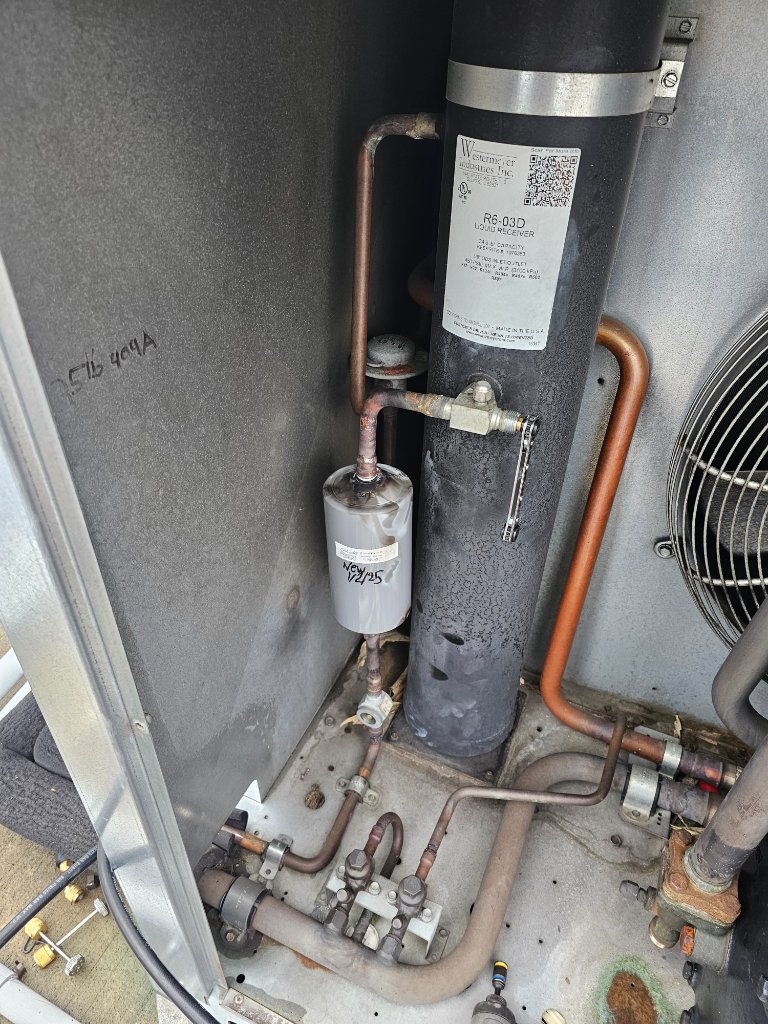 Liquid receiver on a commercial refrigeration system scheduled for R-22 transition