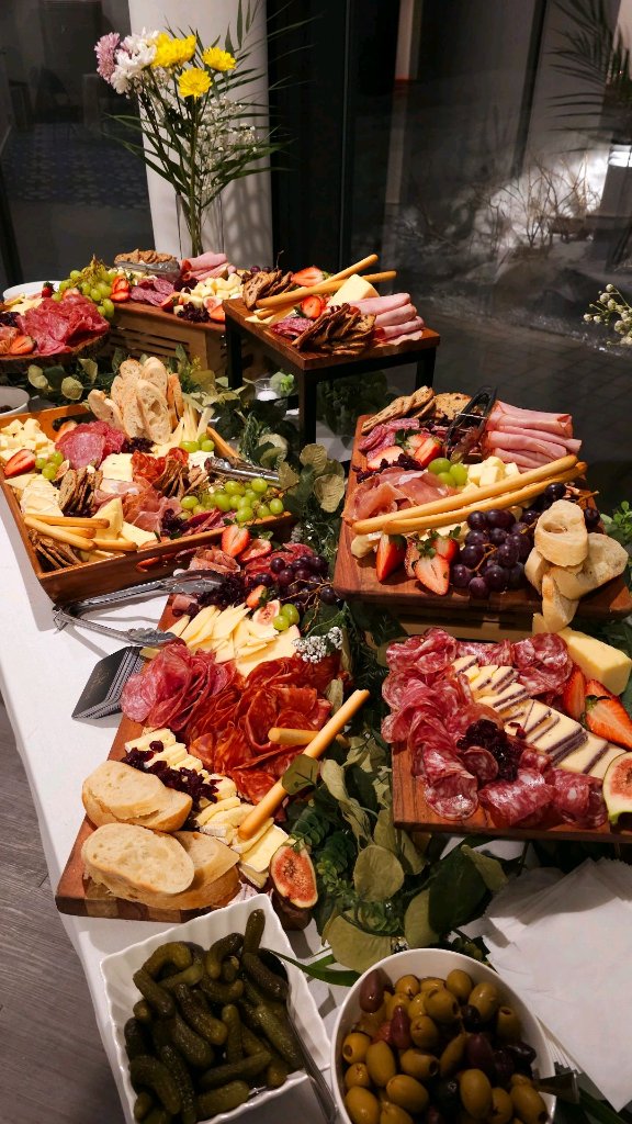 Artisanal grazing station with charcuterie, cheeses, and seasonal accompaniments by Chez Mylo event catering Montreal