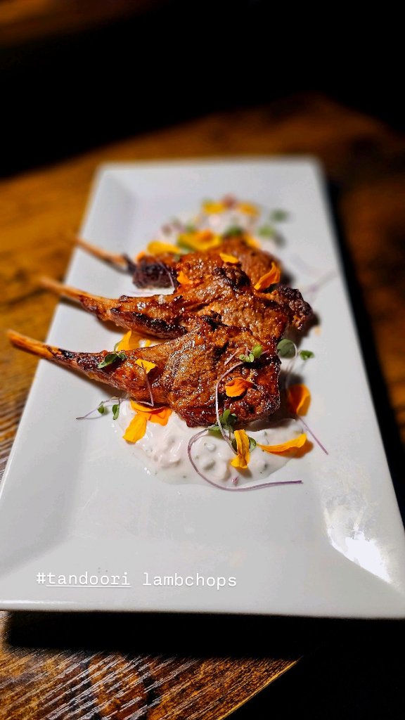 Tandoori-spiced lamb chops served as canapés at a Montreal cocktail reception by Chez Mylo