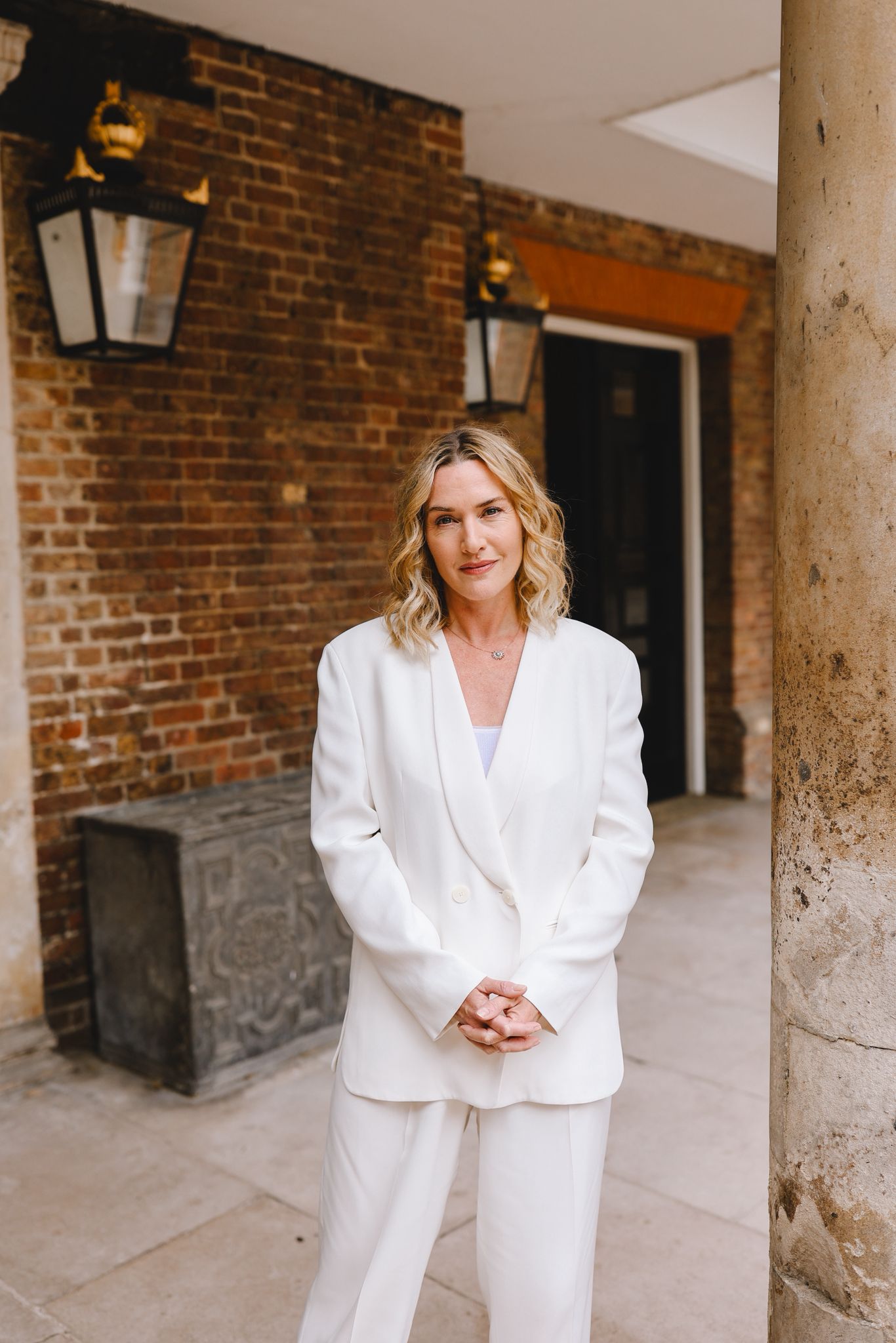 Kate Winslet, Ambassador for The King’s Foundation, photographed in a cloistered corridor at Highgrove.