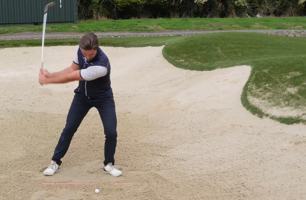 James Willis demonstrating a bunker shot