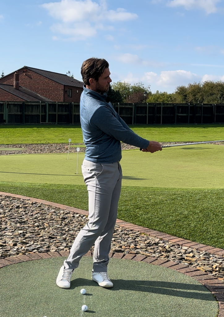 James Willis coaching a short game shot