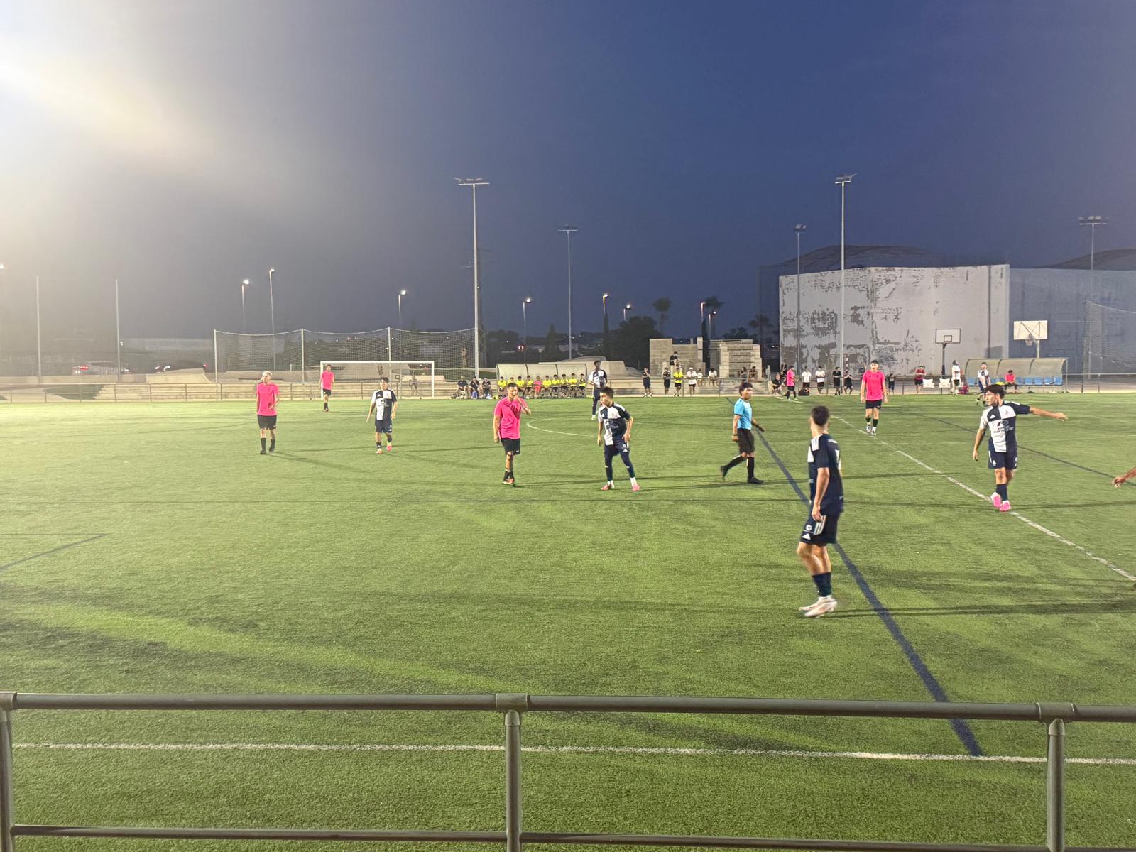 Evening Match — Under the Floodlights