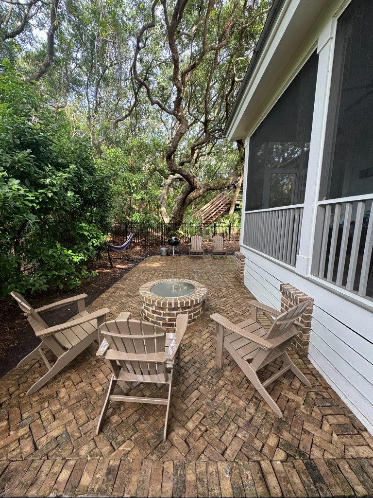 Clean and restored patio with vibrant pavers after Blueprint Construction professional soft wash service — Golden Isles, GA