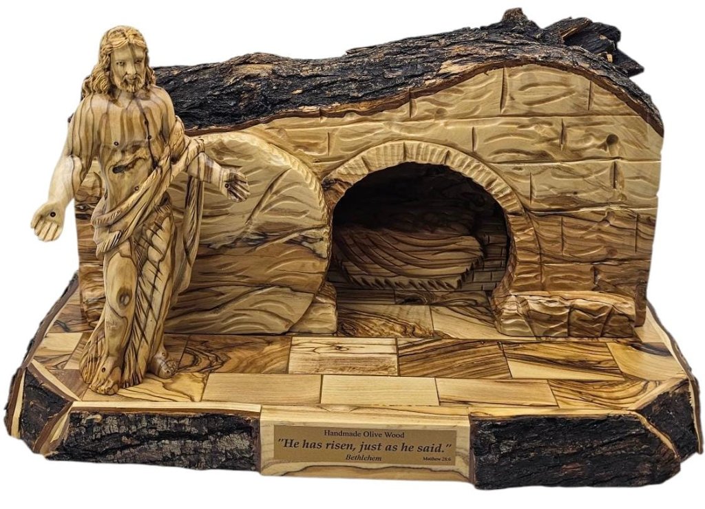 Beautiful olive wood religious carvings on aged linen