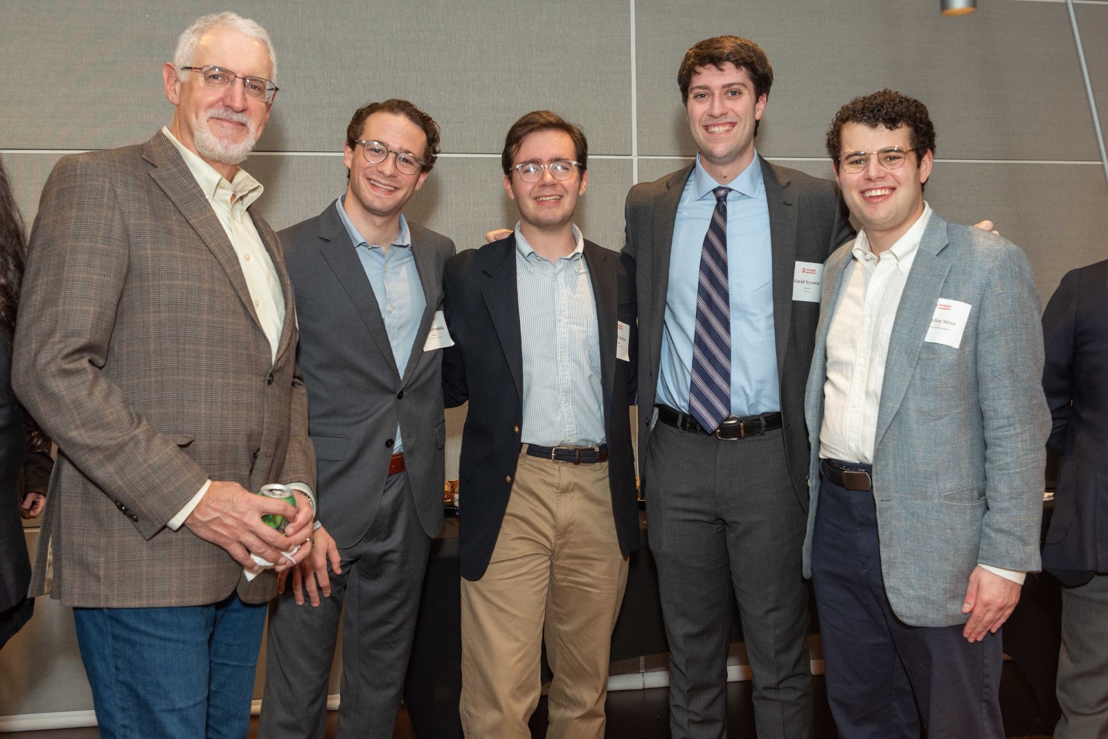 A group of attorneys and students standing together