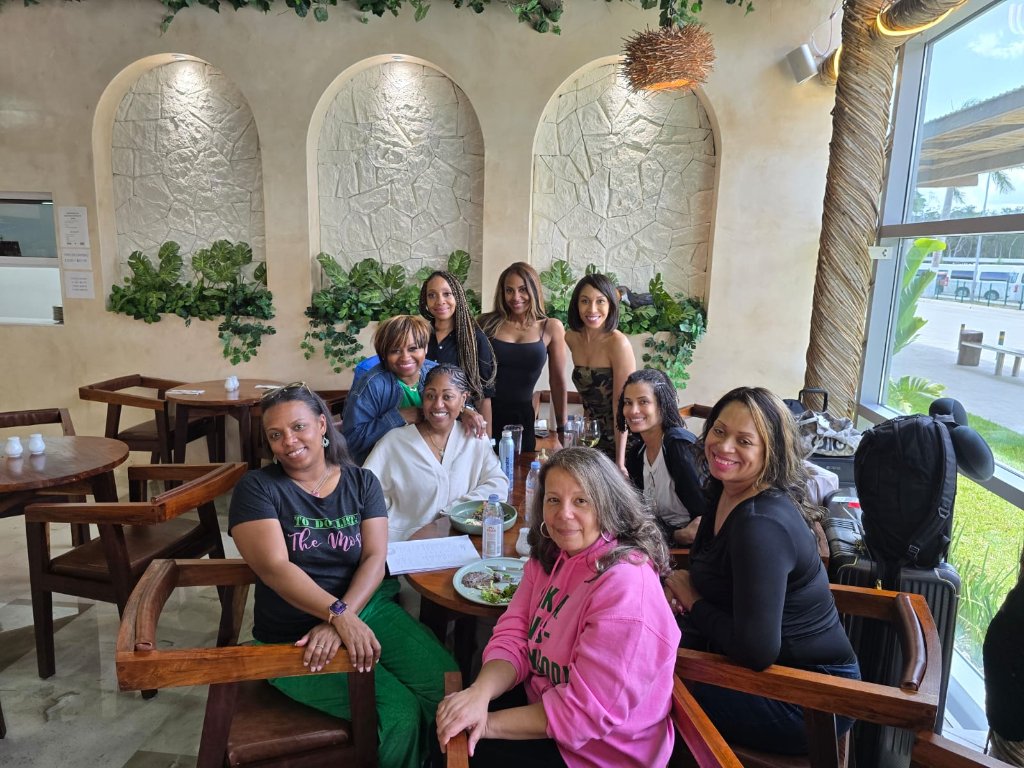 A circle of women gathered together