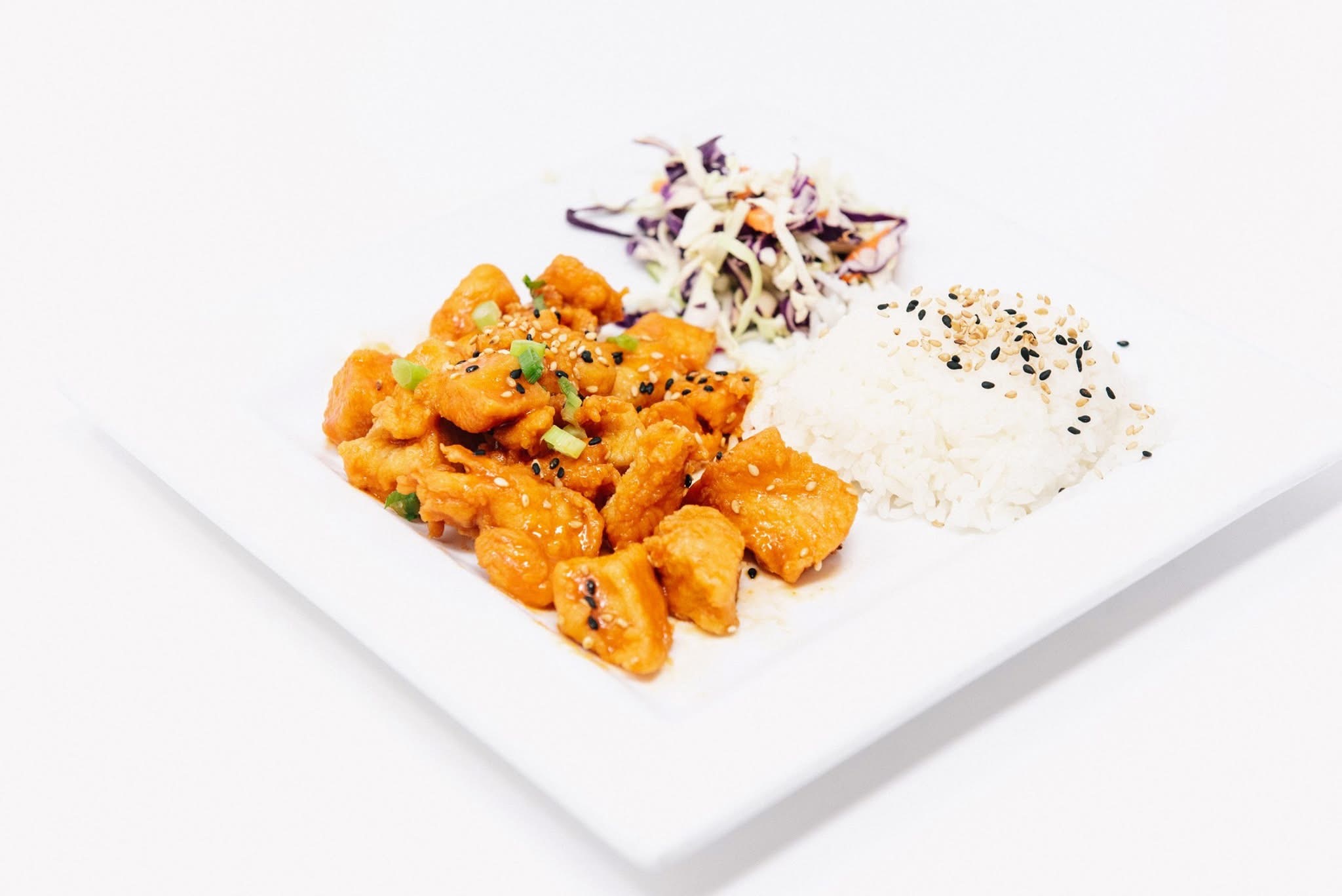 Glazed chicken entree with rice at Sushi Brokers