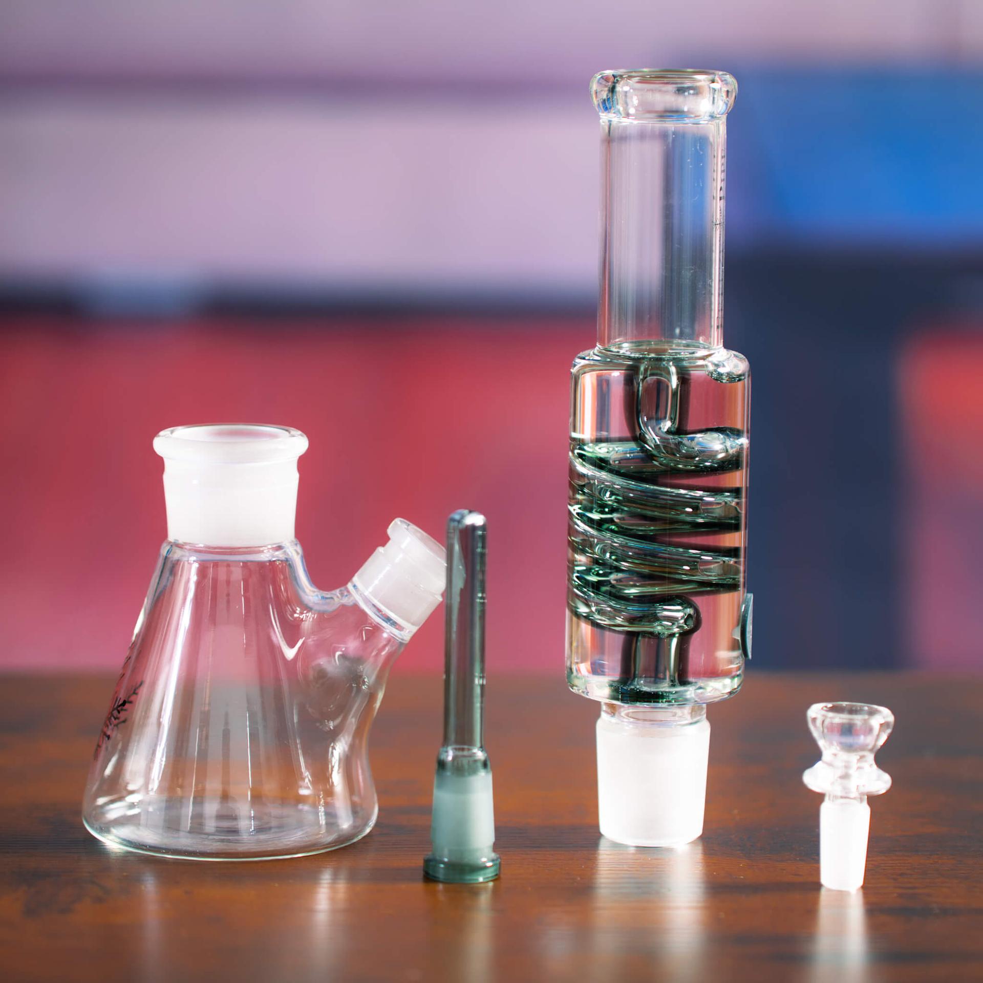 Freeze Pipe Beaker Bong base, spiral coil and bowl displayed as separate components